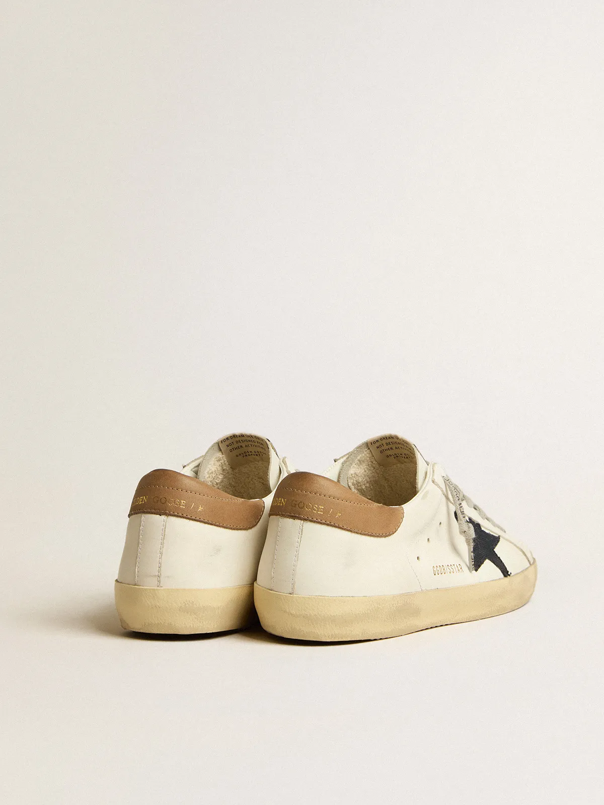 Super-Star with blue canvas star and tobacco leather heel tab