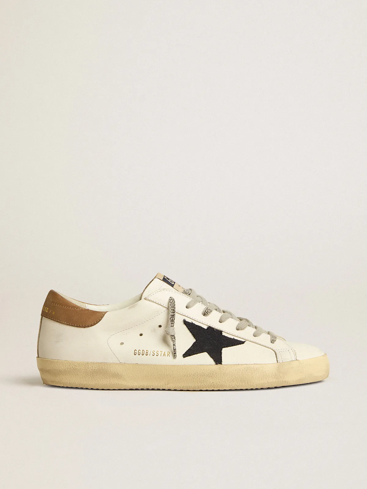 Super-Star with blue canvas star and tobacco leather heel tab